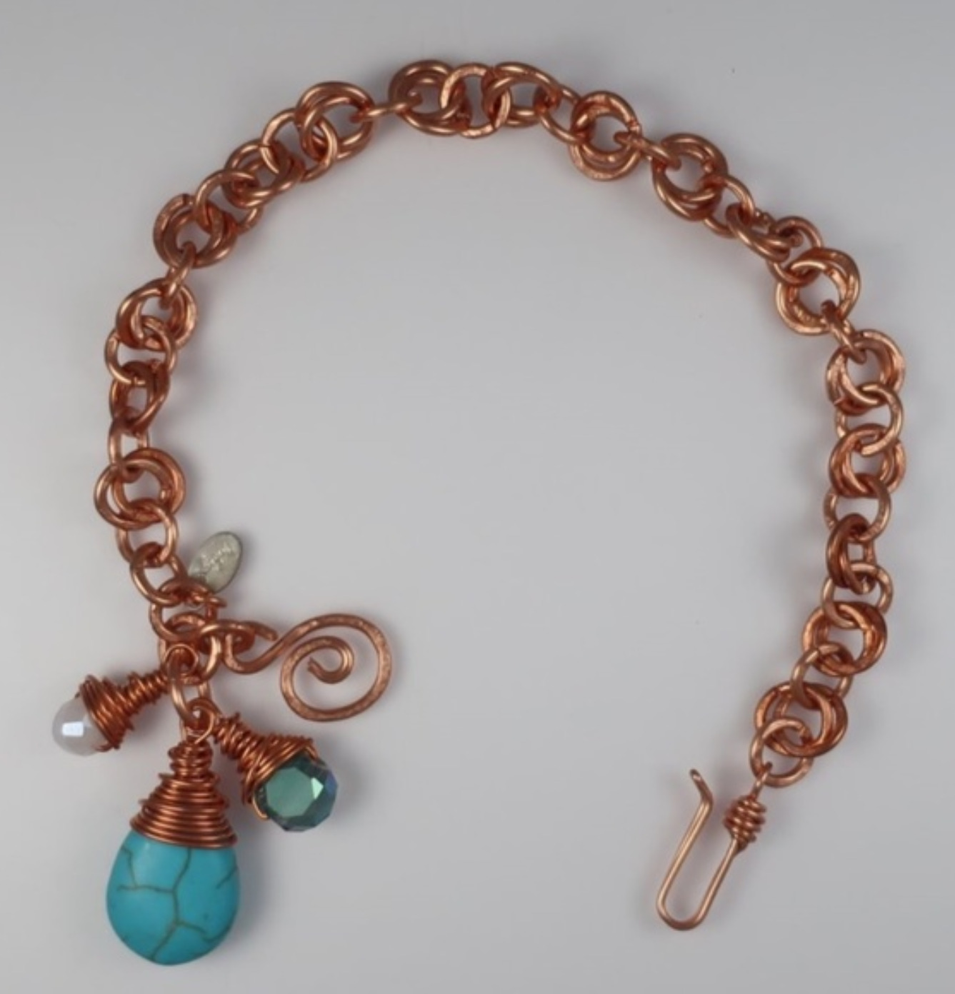 (215 - BCT) - Description: Handcrafted Bracelet, Copper Wire, Turquoise Howlite, Faceted Glass Beads, Hook Closure - Dimension: Adjustable up to 7 1/2 ' L (Inches)