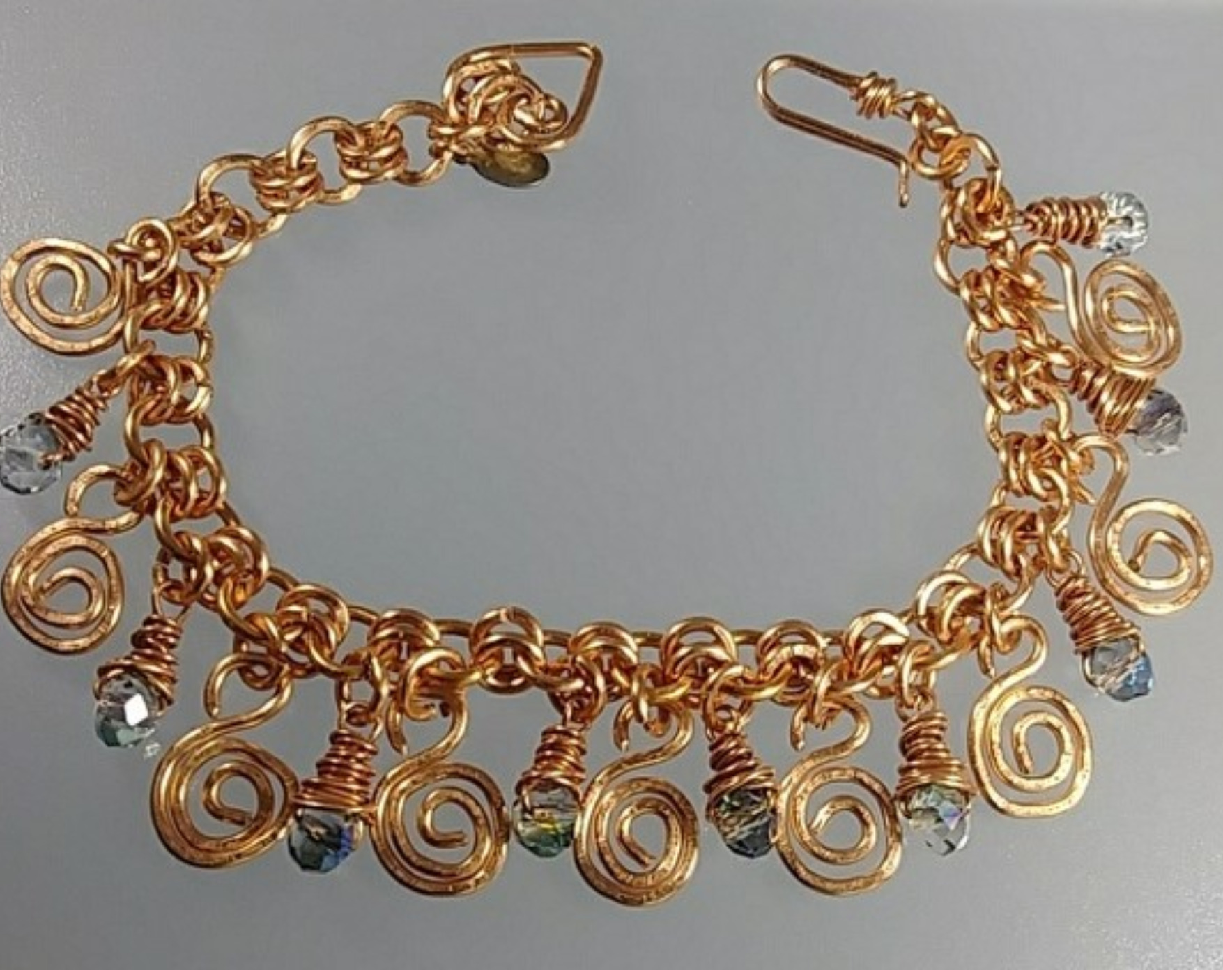 (211-BCT) - Description: Handcrafted Bracelet, Copper Wire, Faceted Glass Beads, Hook Closure - Dimension: Adjustable up to 7 1/2' L (Inches)
