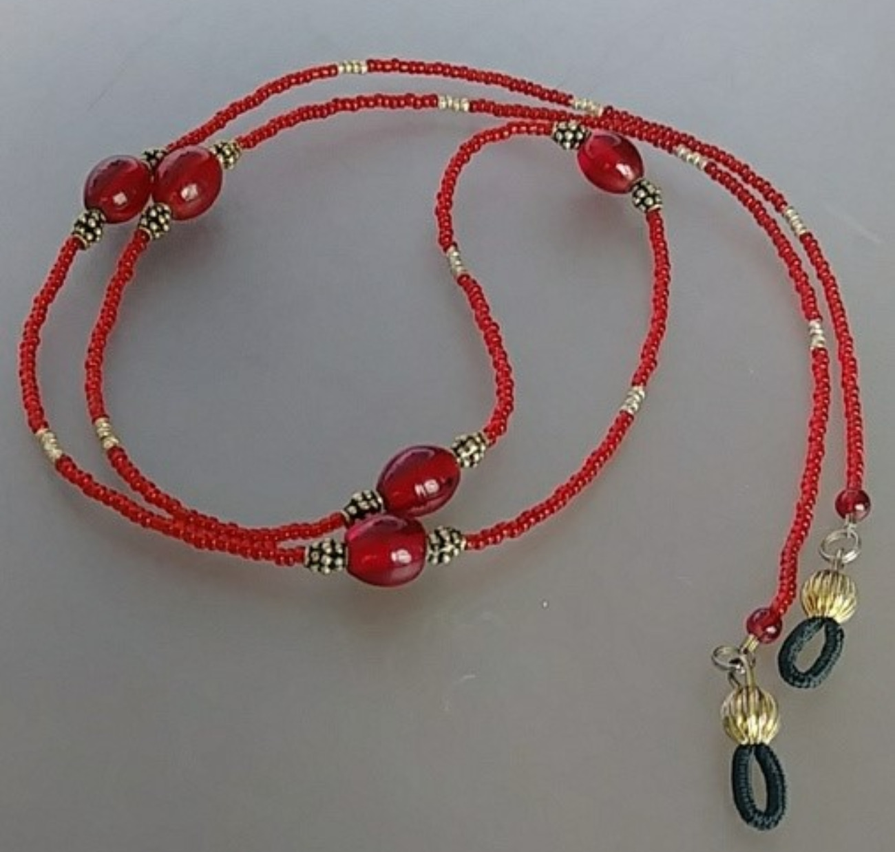 (700-EGC) - Description: Measures 26" L) Glass & Seed Beads, Gold-Plated Beads and Gold Tone Eye Glass Holder