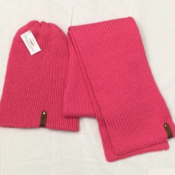 Item # 919 - Unisex Accessories - Material: 100% Acrylic Yarn, Custom Riveted Faux Leather Tags Construction: Double Layered Knit Scarf and Beanie Color(s): Rose Pink Size: OS Stretchable