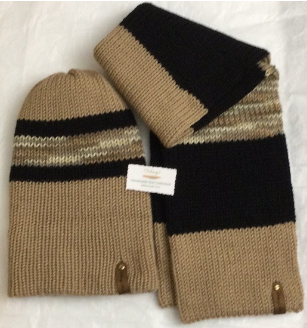 Item # 912 Material: 100% Acrylic Yarn, Custom Riveted Faux Leather Tags Construction: Double Layered Knit Scarf and Beanie Color(s): Barley, Chocolate Brown and Toasted Almond Size: OS Stretchable