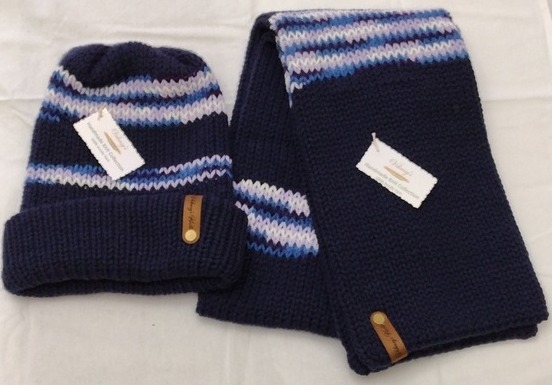 Item # 917 Material: 100% Acrylic Yarn, Custom Riveted Faux Leather Tags Construction: Double Layered Knit Scarf and Beanie Color(s): Navy Blue and Purple Impression Size: OS Stretchable