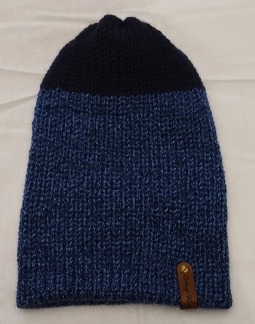 Item # 2004 - Unisex Accessory - Material: 100% Acrylic Yarn / Custom Faux Leather Tag - Care: Hand Wash, Cold Water, Dry Flat - Construction: Reversible, Double Layered Knit Beanie (handmade) - Size: Adult (One Size) Stretchable - Color(s): Navy Blue and Multi-Colored Yarn - Item packed in clear resealable plastic storage bag